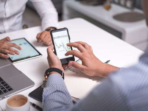 person holding black smartphone